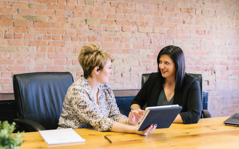 CEO - CDO 800x500 Two women executives at a table