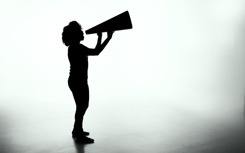 person with megaphone