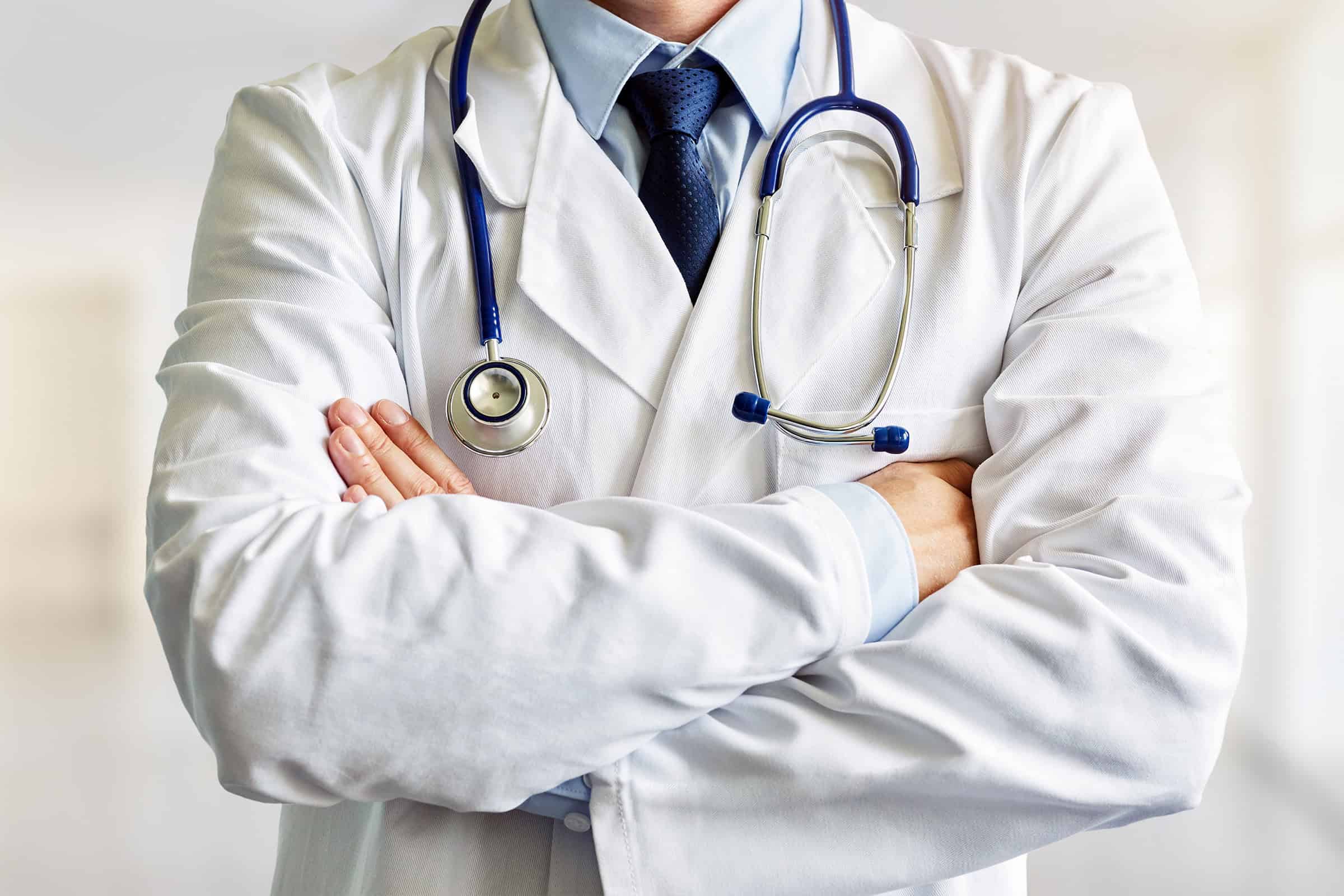 Male doctor with crossed arms