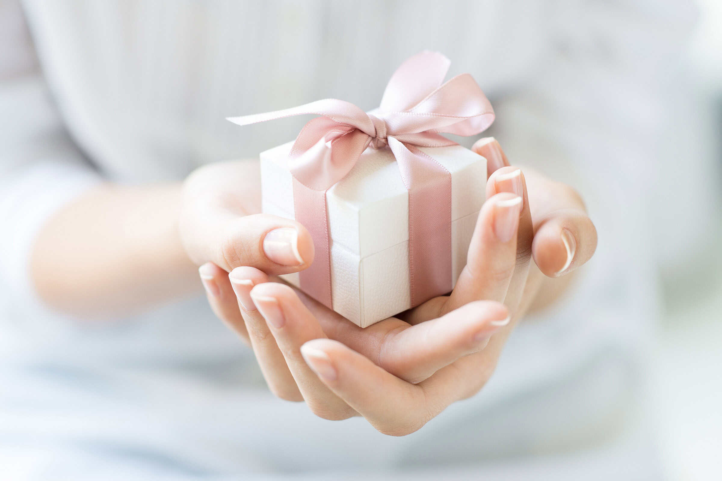 Gift in cupped hands