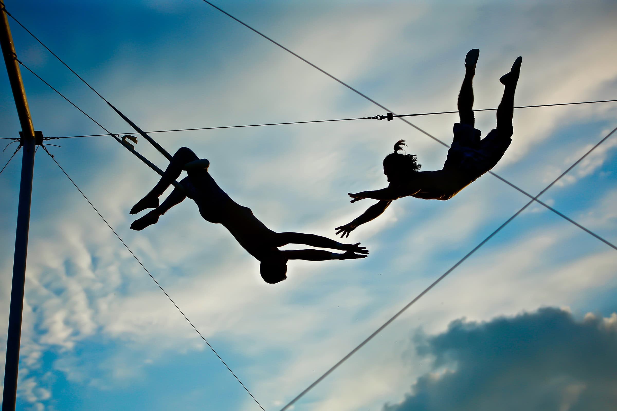 Two men on a trapeze