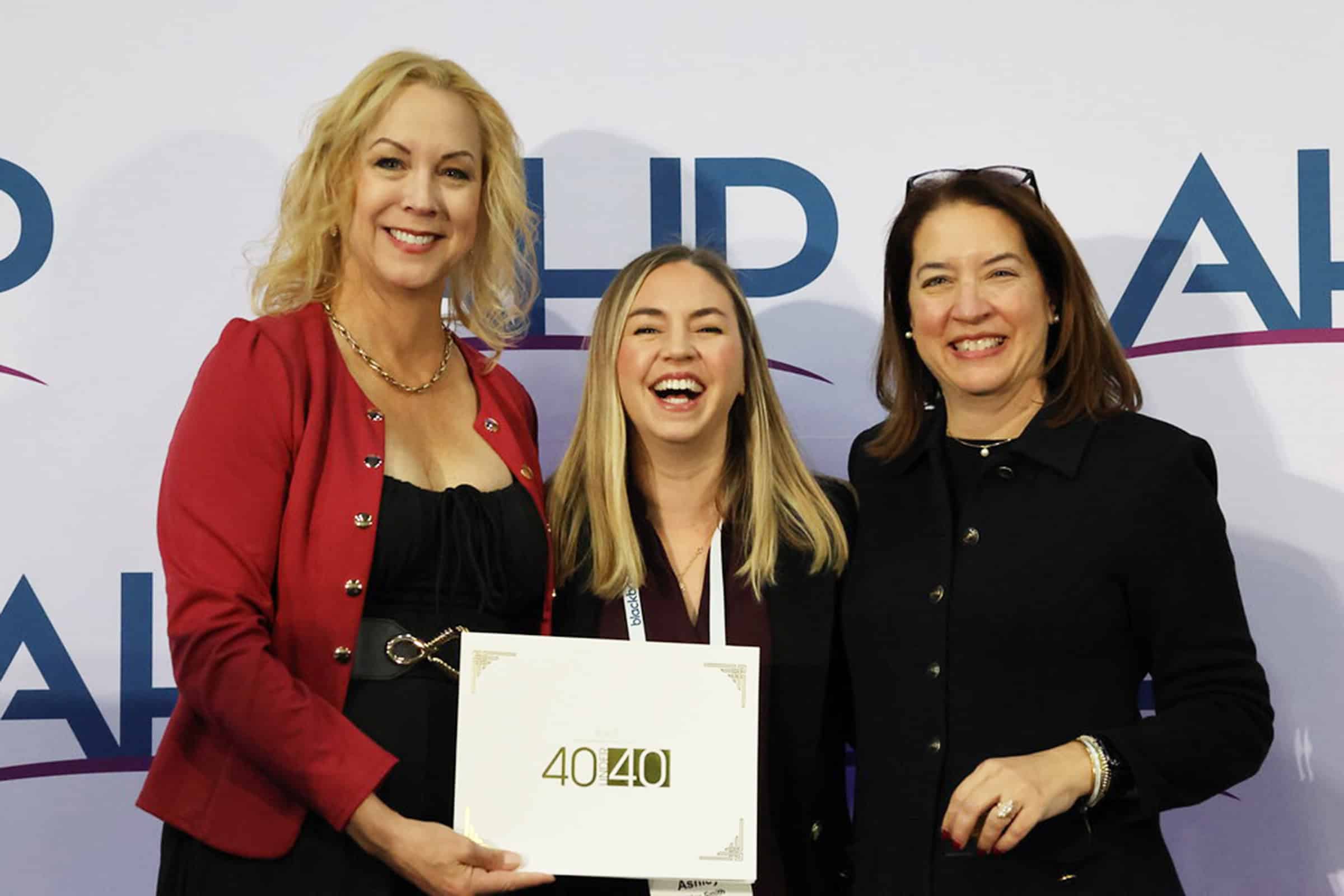 Young woman smiling with certificate