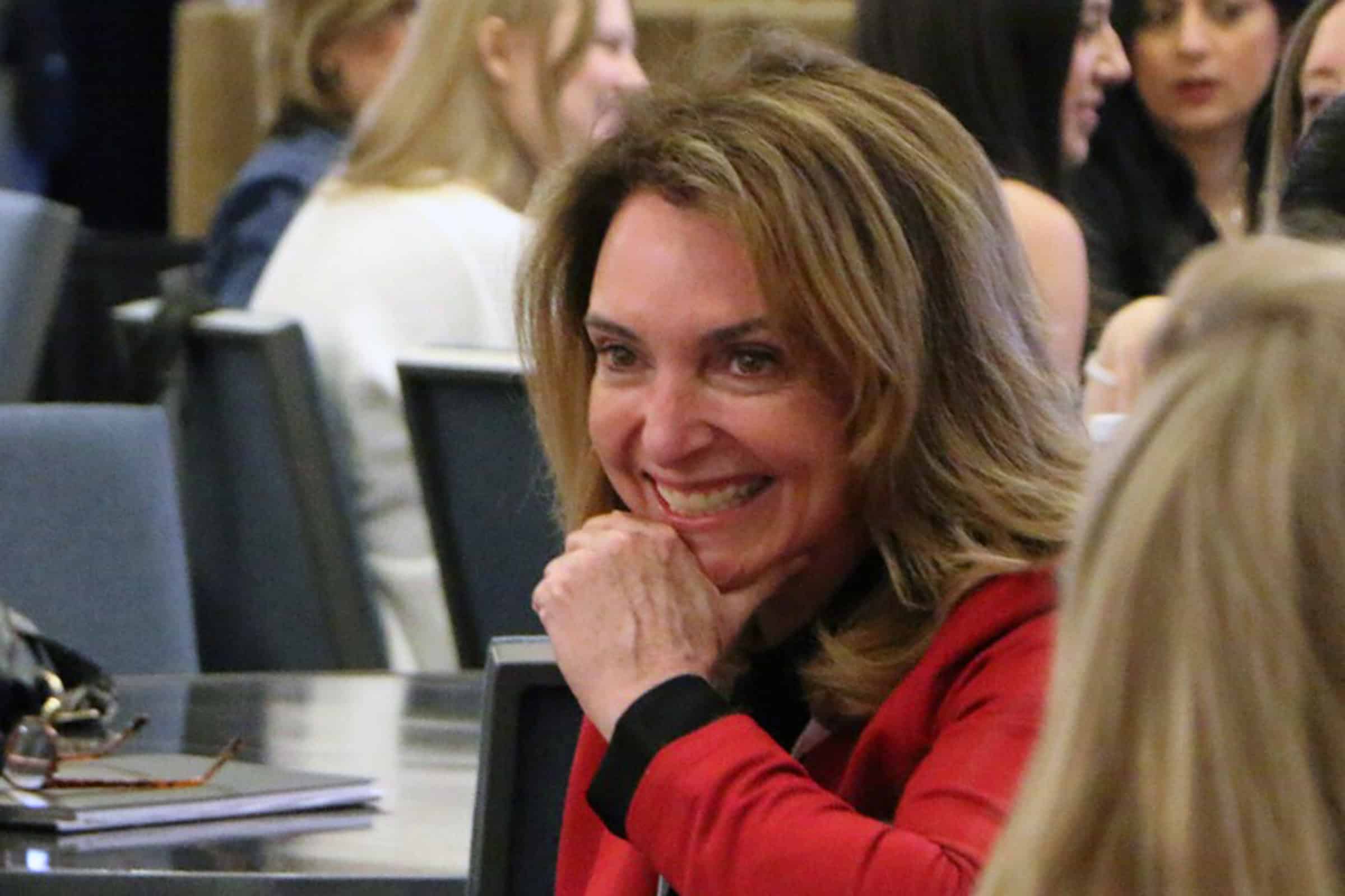 closeup of a smiling middle aged woman