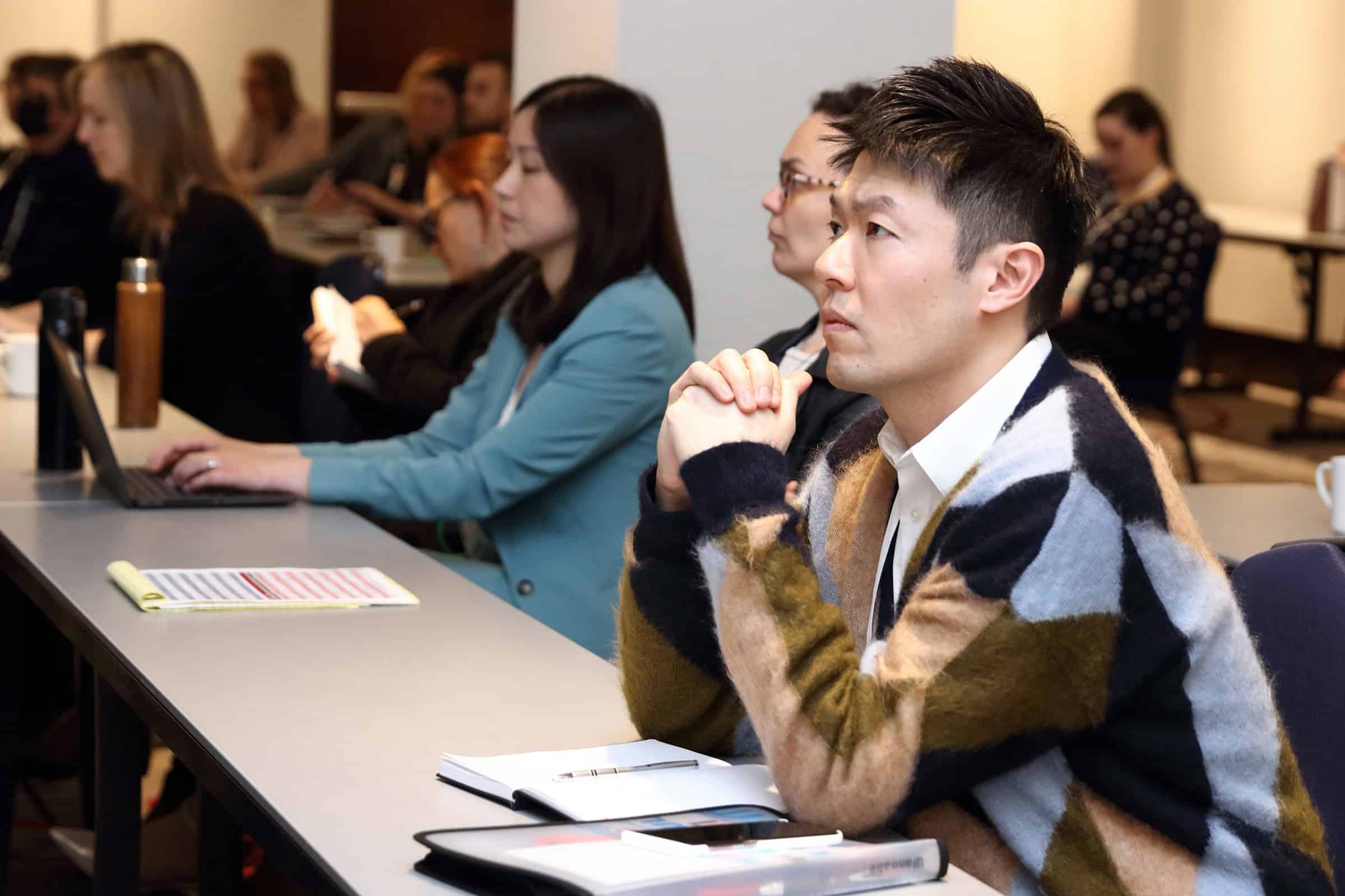 people learning at a table