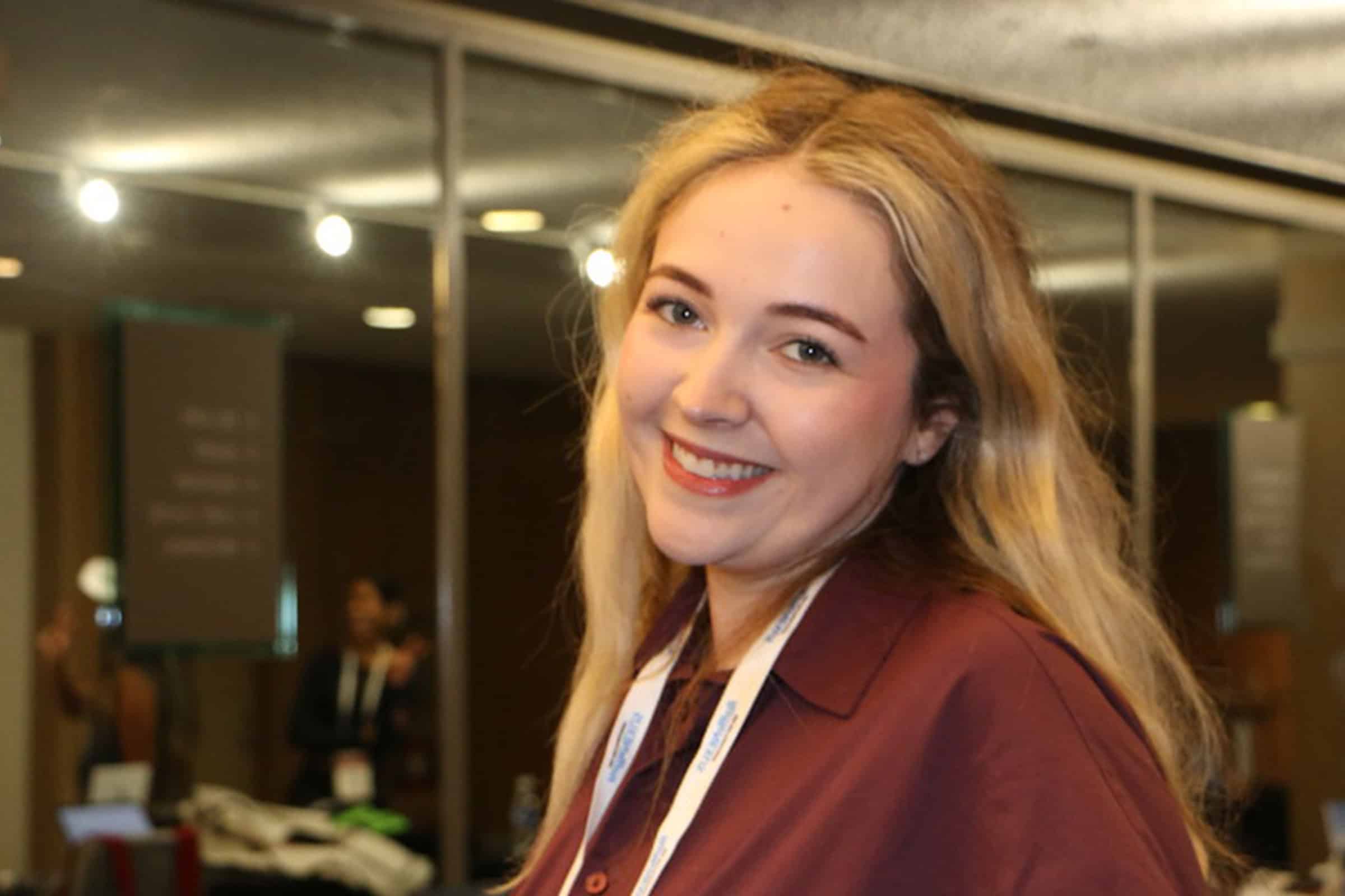 young woman smiling at the camera