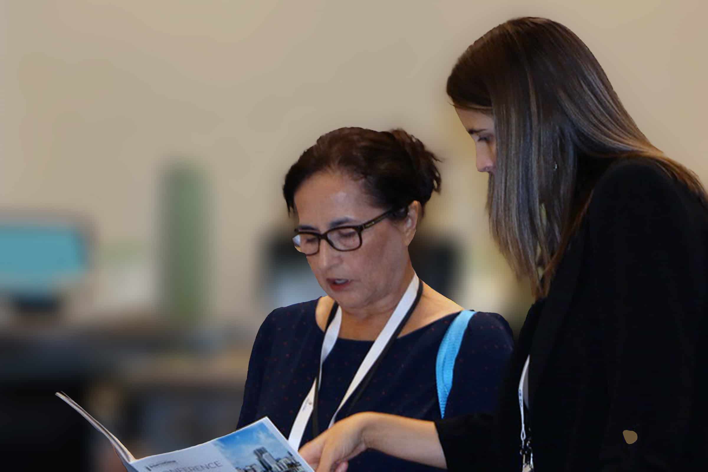 two women reviewing a report
