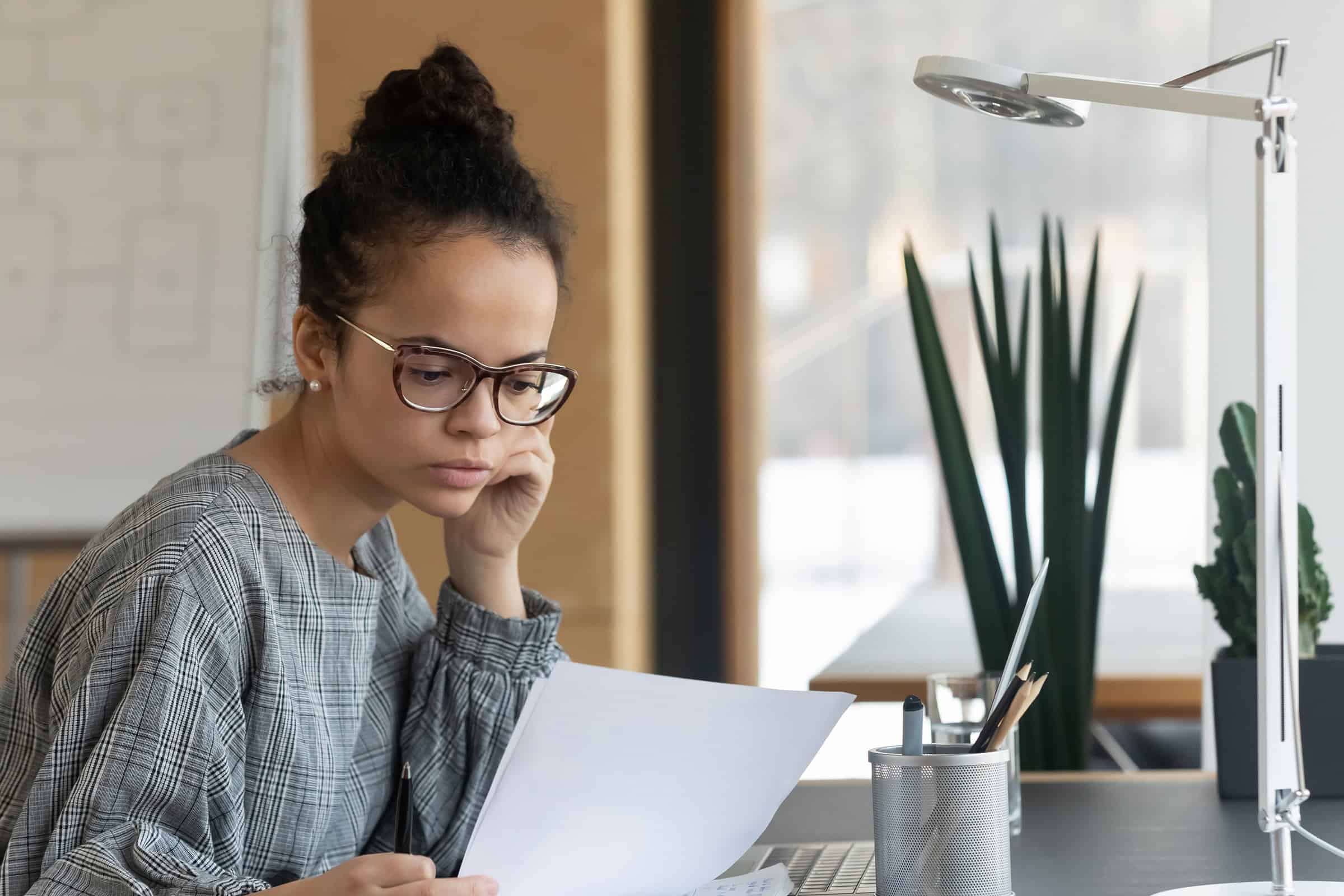 Young woman reviewing a report