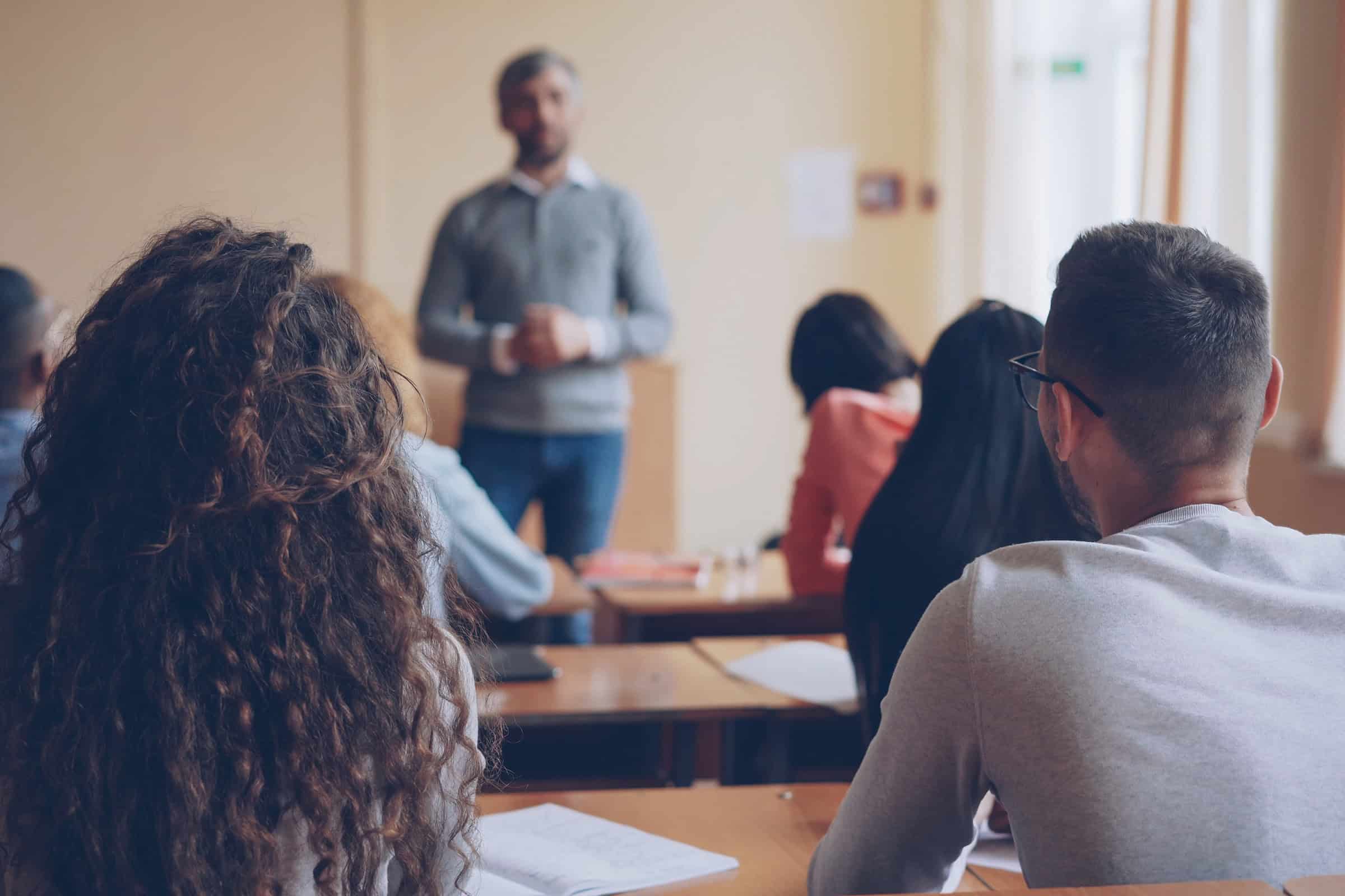 adults learning in a classroom